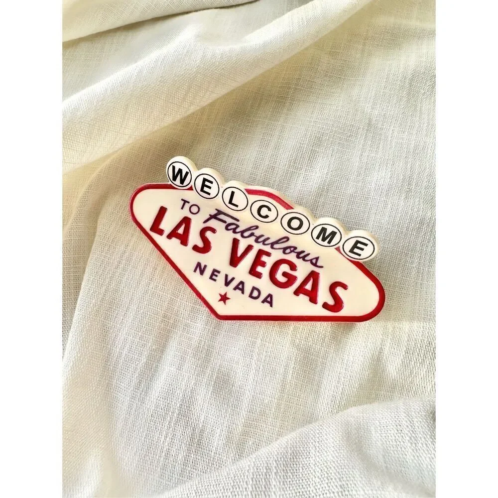 Welcome to Las Vegas black, red, and cream hair claw